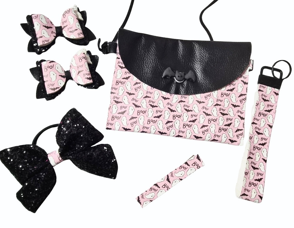 Handmade Boo Bats Halloween purse gift set featuring a matching purse, large hair bow, two mini bows, wristlet, and ponytail holder for girls.