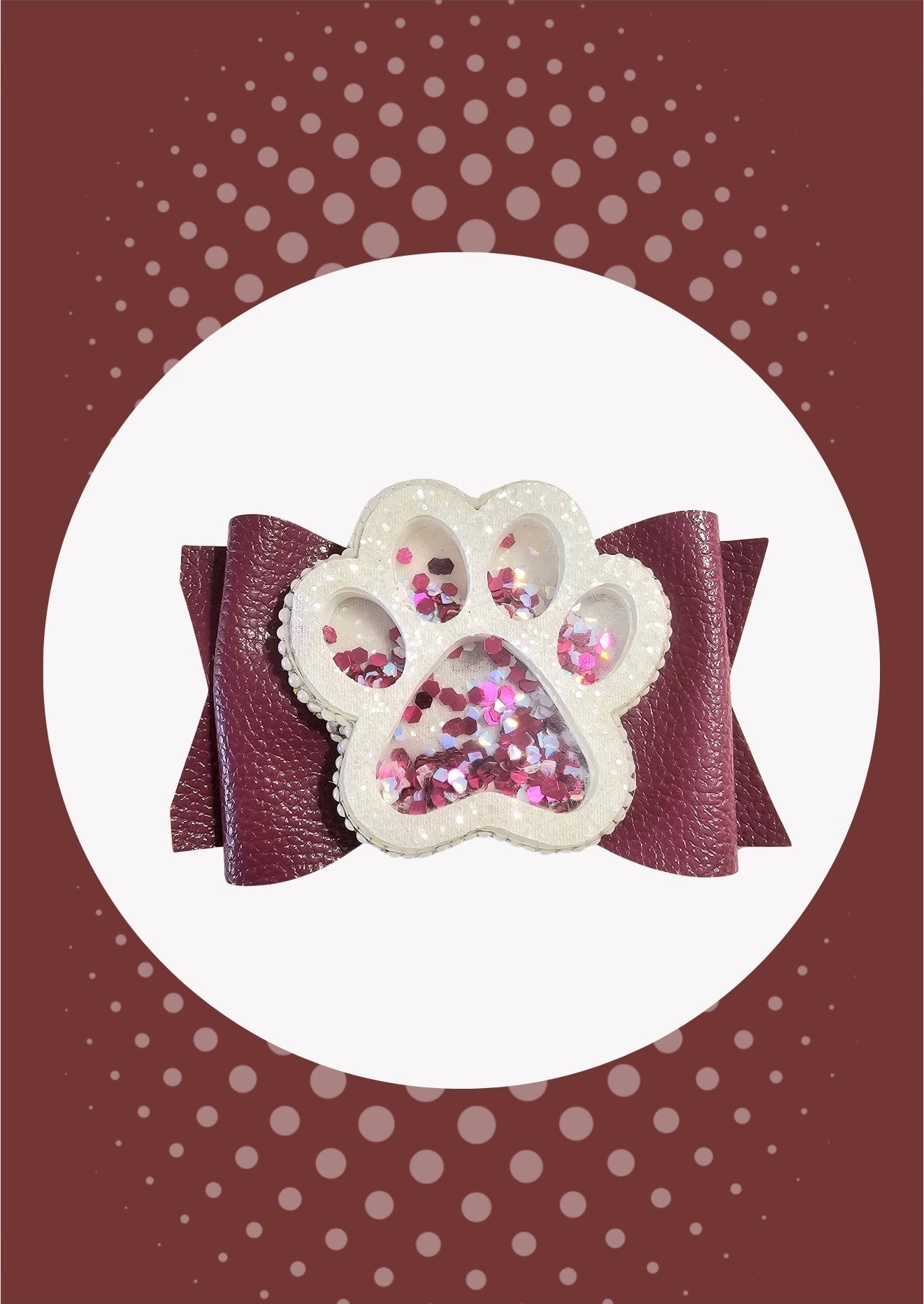 Handmade glitter paw print hair bow for girls, perfect for school spirit events, pep rallies, sporting events, and cheer.