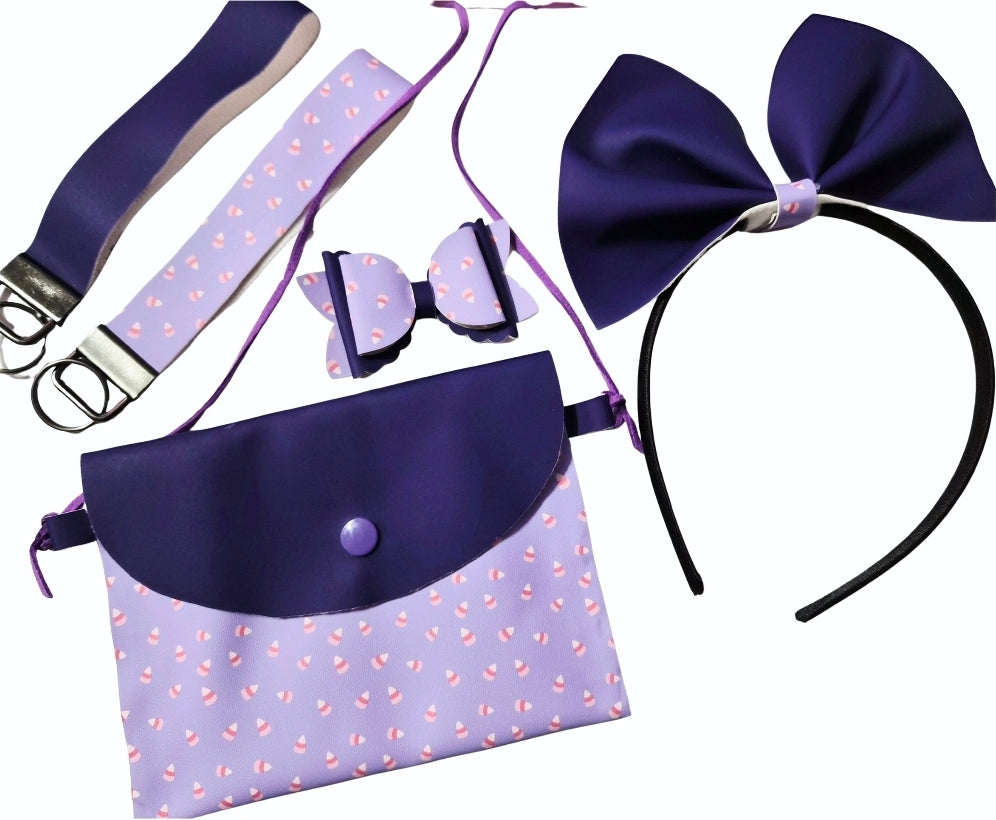 Handmade pastel purple Halloween purse set with matching headband, mini hair bow, and wristlets featuring heat-changing fabric on a festive Halloween background.