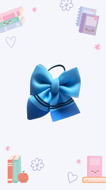 Handmade blue hair bow ponytail holder for girls, perfect for back-to-school outfits and the first day of school. 