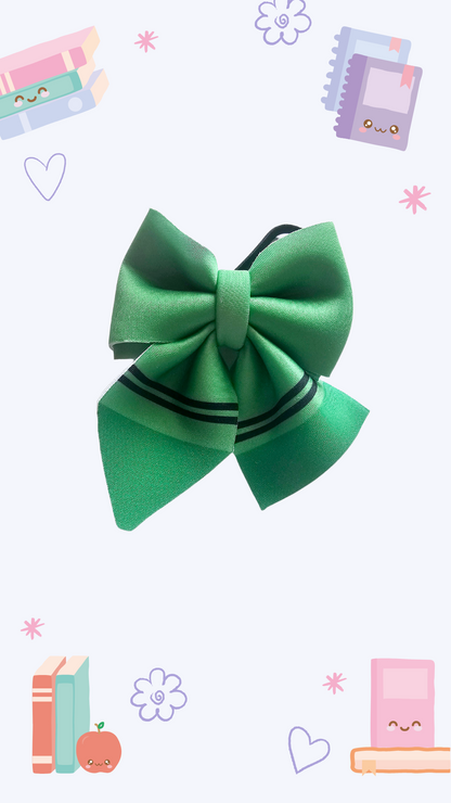 Handmade green hair bow ponytail holder for girls, perfect for back-to-school outfits and the first day of school. 