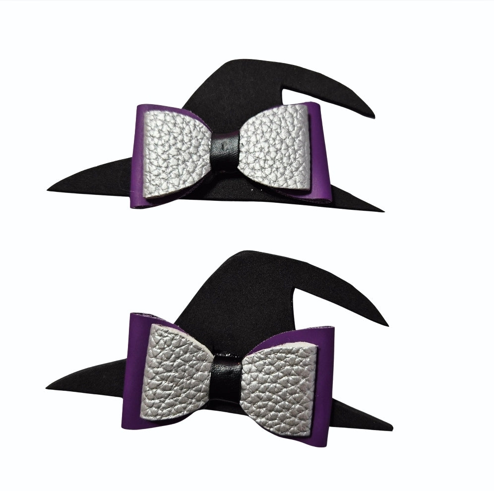 Two handmade Halloween witch hat hair bows with black witch hats, silver glitter bows, and purple accents for babies, toddlers, and little girls.