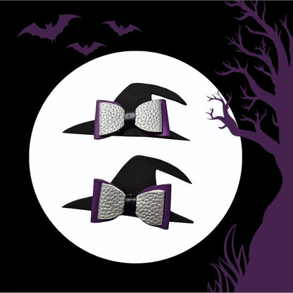 Two handmade Halloween witch hat hair bows with black witch hats, silver glitter bows, and purple accents for babies, toddlers, and little girls.