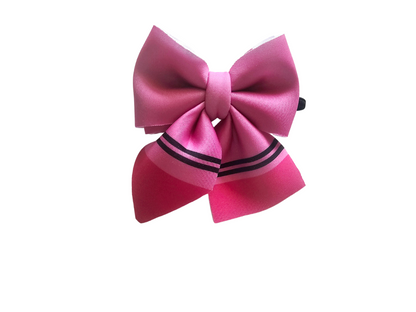 Handmade pink hair bow ponytail holder for girls, perfect for back-to-school outfits and the first day of school. 