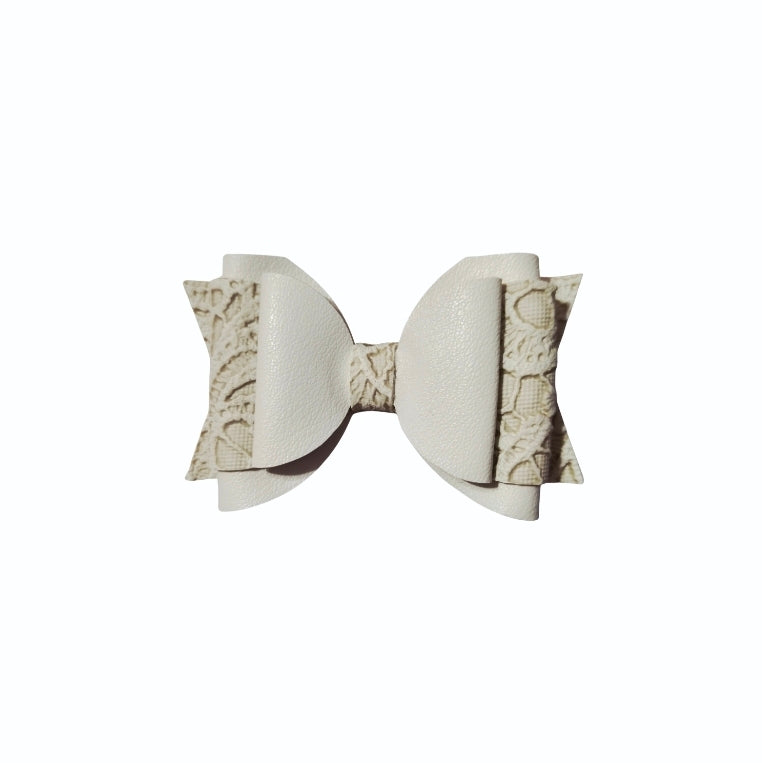 Handmade white faux leather lace boutique hair bow for girls, perfect for weddings, church, birthdays, family photos, and everyday wear.