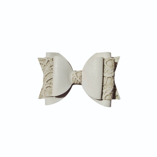 Handmade white faux leather lace boutique hair bow for girls, perfect for weddings, church, birthdays, family photos, and everyday wear.