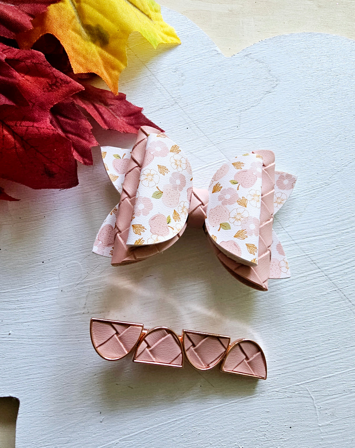 Handmade Apple Picking faux leather hair bow with matching blush pink snap clip featuring an apple print for babies, toddlers, and girls.