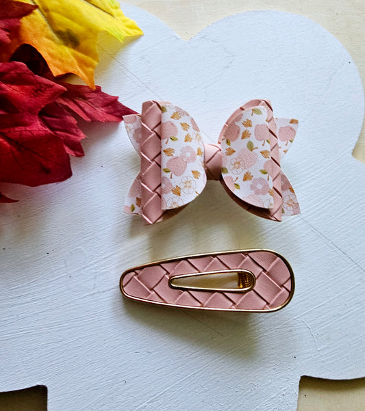 Handmade Apple Picking faux leather hair bow with matching blush pink snap clip featuring an apple print for babies, toddlers, and girls.