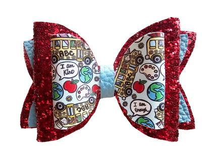 Handmade back-to-school hair bow for girls, perfect for first-day-of-school outfits, picture day, and everyday school wear.
