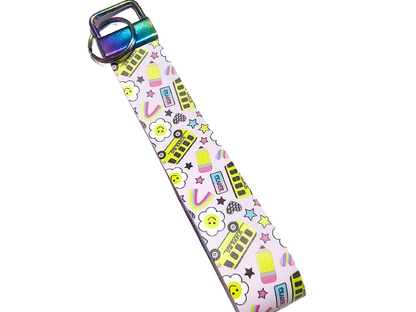 Handmade back-to-school accessory set featuring a matching purse, hair bow, and wristlet for girls, perfect for the first day of school.