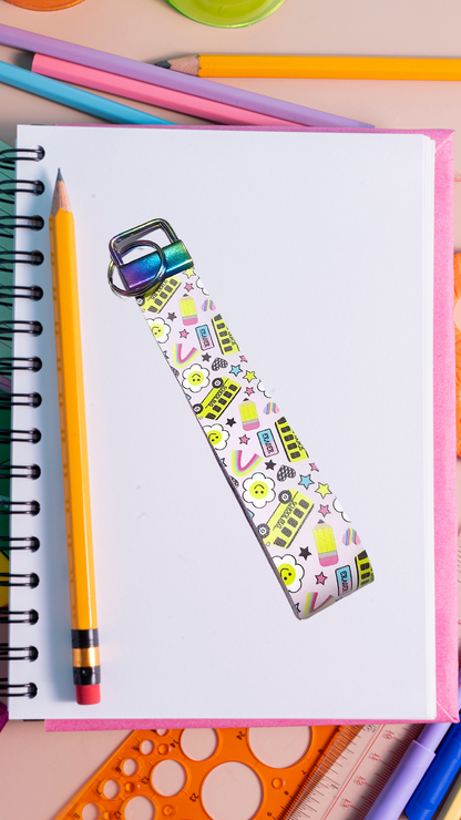 Handmade back-to-school accessory set featuring a matching purse, hair bow, and wristlet for girls, perfect for the first day of school.