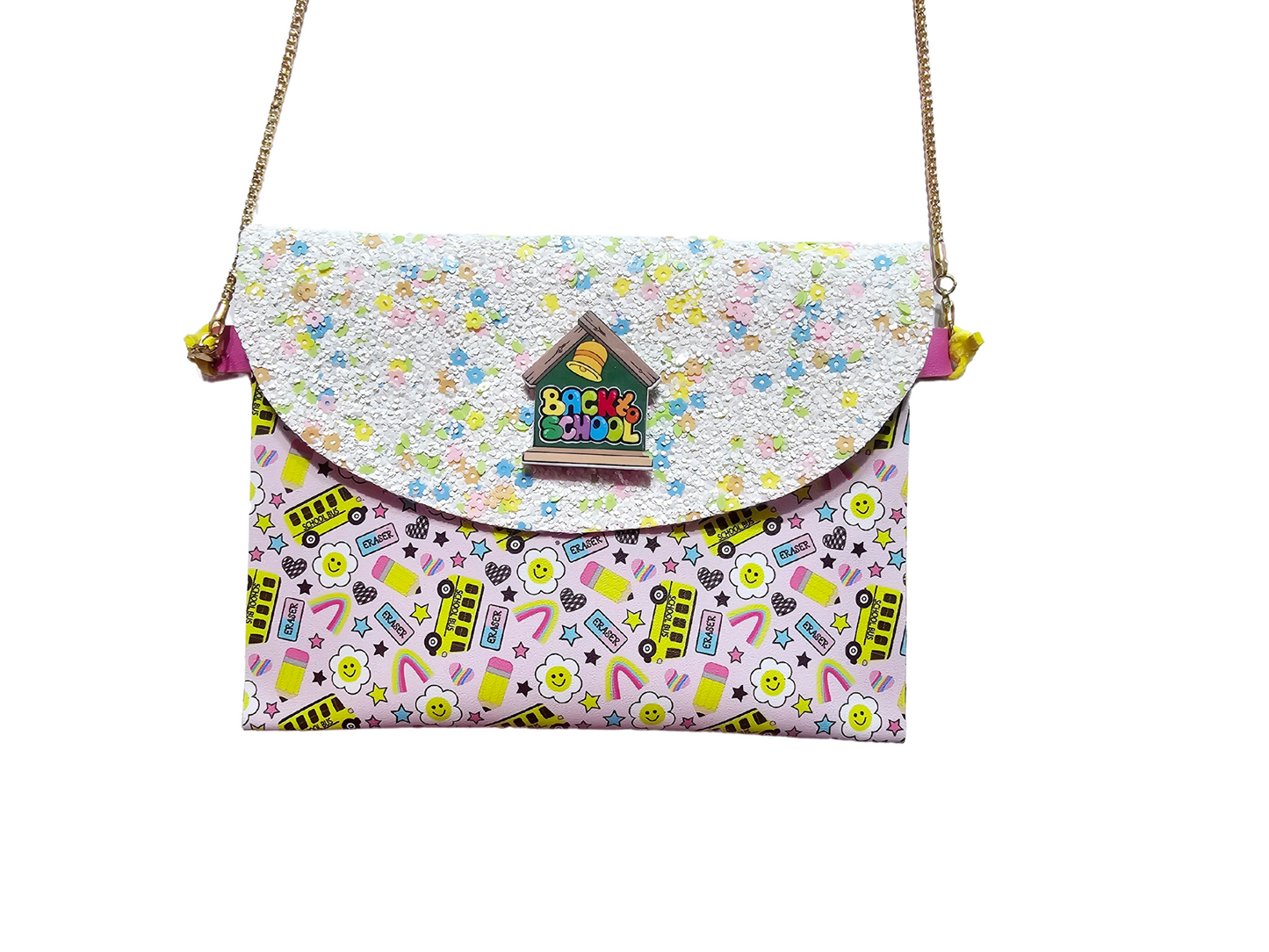 Handmade back-to-school accessory set featuring a matching purse, hair bow, and wristlet for girls, perfect for the first day of school.