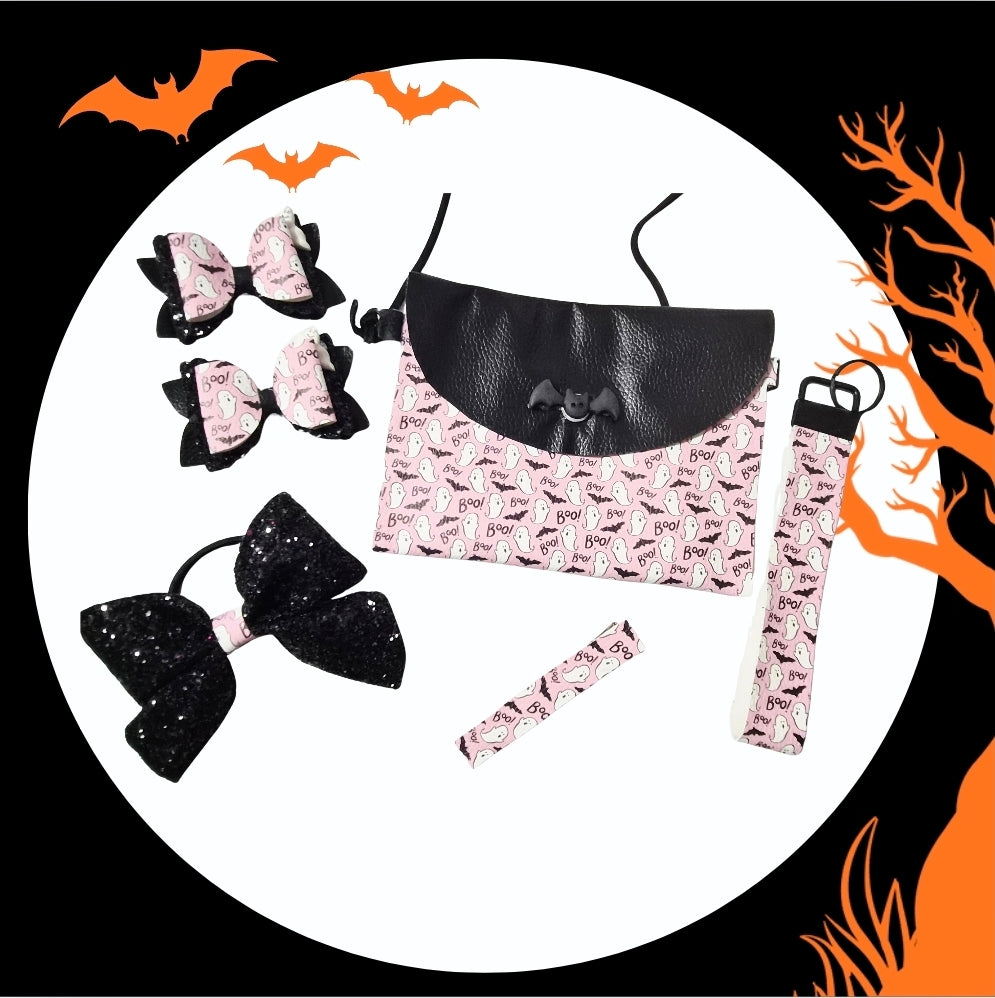 Handmade Boo Bats Halloween purse gift set featuring a matching purse, large hair bow, two mini bows, wristlet, and ponytail holder for girls.
