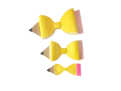 Handmade classic yellow pencil hair bow for girls, perfect for back-to-school outfits, picture day, and the first day of school.