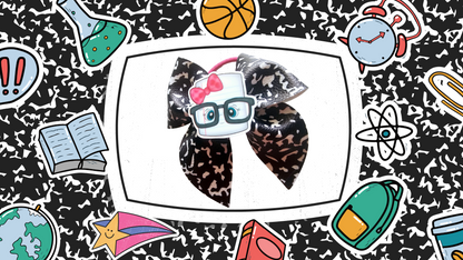 Handmade school notebook ponytail holders for girls featuring notebook-inspired designs, perfect for back-to-school outfits, picture day, and everyday school wear.