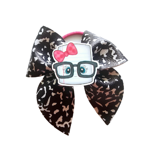 Handmade school notebook ponytail holders for girls featuring notebook-inspired designs, perfect for back-to-school outfits, picture day, and everyday school wear.