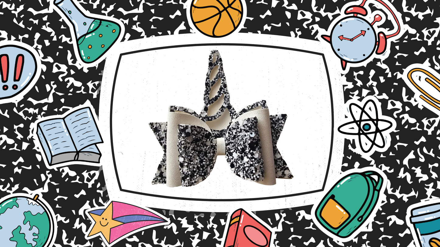Handmade composition notebook unicorn hair bow for girls, perfect for back-to-school outfits, picture day, and unicorn lovers.