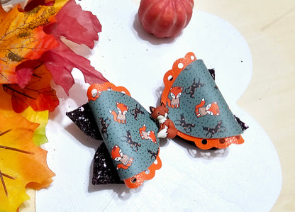 Handmade Fox in the Fall faux leather boutique hair bow with woodland fox print for babies, toddlers, and girls.
