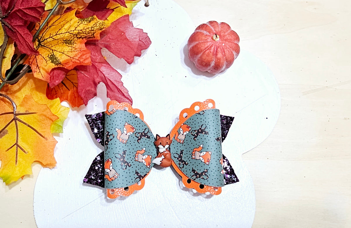 Handmade Fox in the Fall faux leather boutique hair bow with woodland fox print for babies, toddlers, and girls.