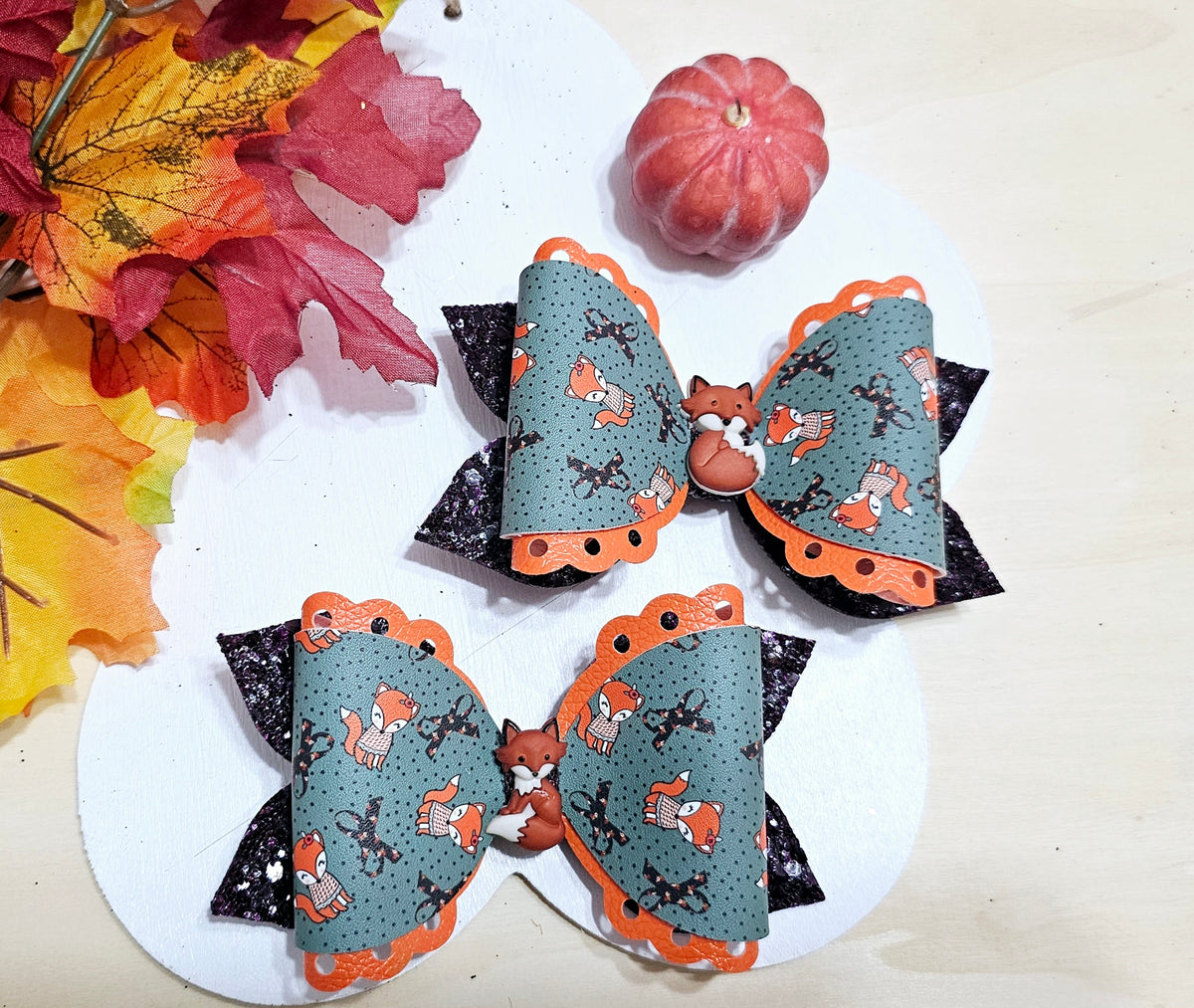 Handmade Fox in the Fall faux leather boutique hair bow with woodland fox print for babies, toddlers, and girls.