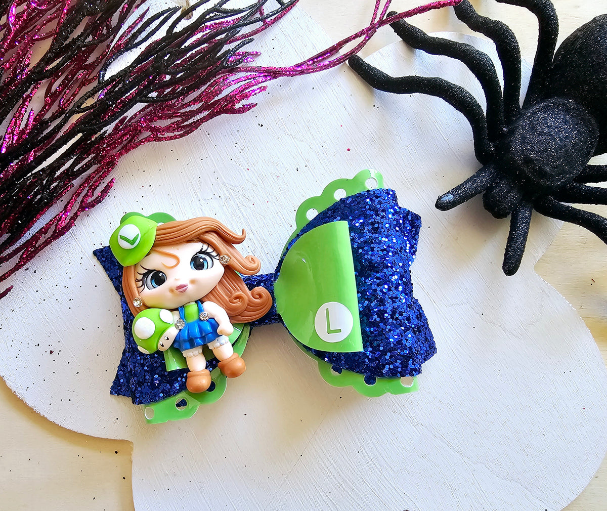 Handmade Halloween costume doll boutique hair bow featuring a spooky character-inspired design for girls.