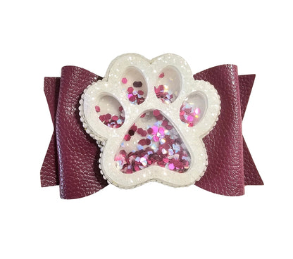 Handmade glitter paw print hair bow for girls, perfect for school spirit events, pep rallies, sporting events, and cheer.