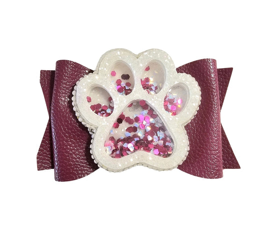 Handmade glitter paw print hair bow for girls, perfect for school spirit events, pep rallies, sporting events, and cheer.