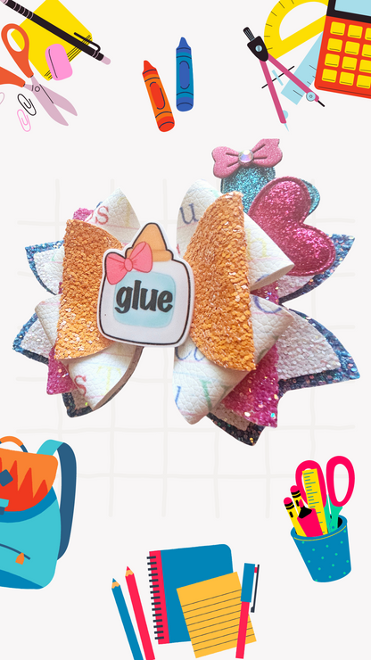 Handmade school glue hair bow for girls, perfect for back-to-school outfits, picture day, and school-themed accessories.