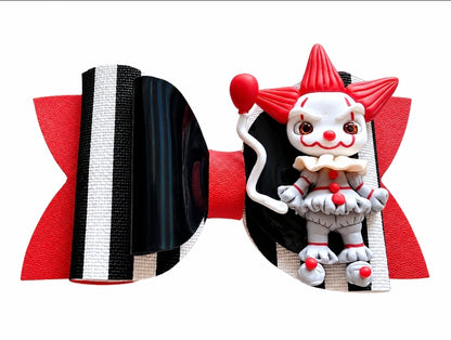 Handmade Scary Clown Halloween hair bow featuring glitter accents and a detailed creepy clown centerpiece for girls.
