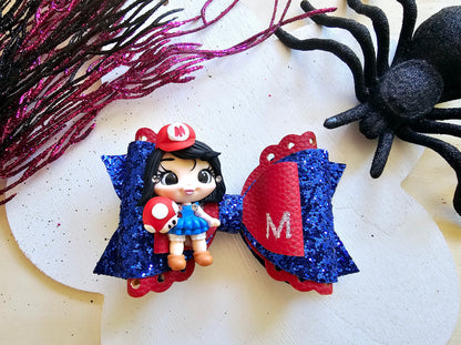 Handmade Halloween costume doll boutique hair bow featuring a spooky character-inspired design for girls.