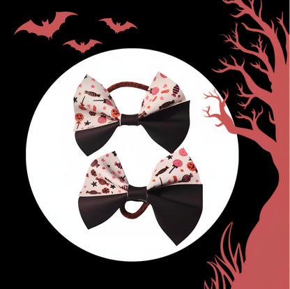 Heat changing Halloween candy hair bow handmade for girls featuring colorful candy print.