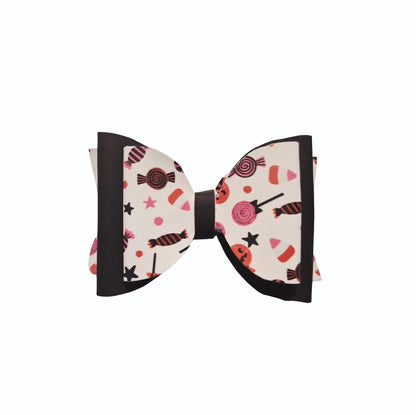 Boutique Halloween candy hair bow with heat changing material and faux leather accents