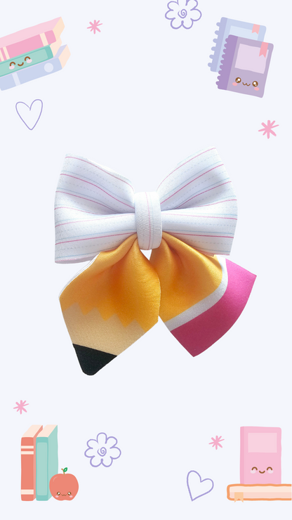 Handmade paper and pencil ponytail holder for girls, perfect for back-to-school outfits, picture day, and the first day of school.