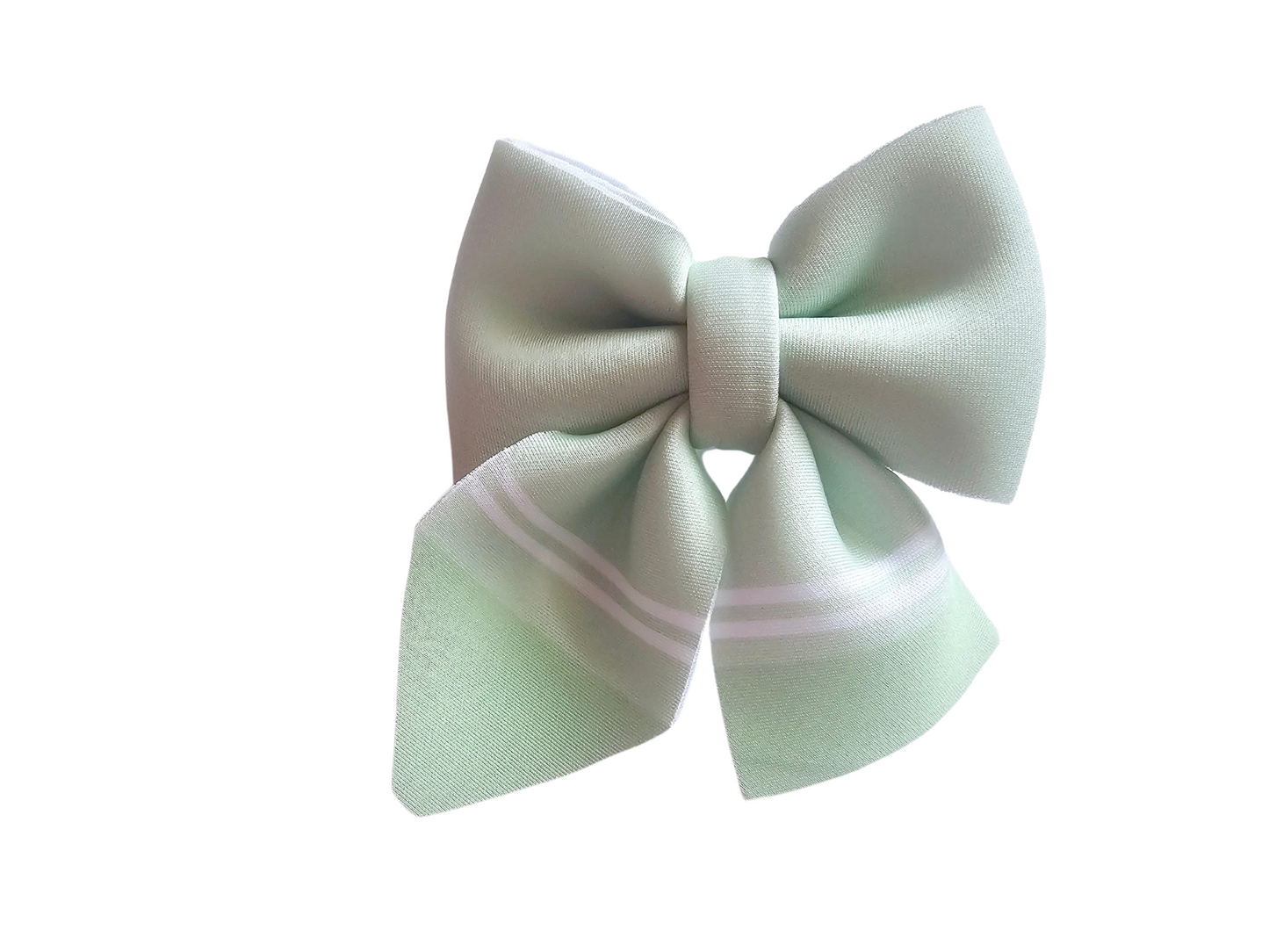 Handmade pastel green crayon hair bow ponytail holder for girls, perfect for back-to-school outfits and the first day of school.