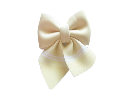 Handmade pastel yellow crayon hair bow ponytail holder for girls, perfect for back-to-school outfits and the first day of school.