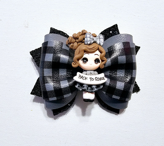 Handmade plaid school uniform hair bow for girls, perfect for back-to-school outfits, school uniforms, and picture day.