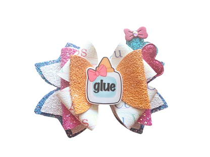 Handmade school glue hair bow for girls, perfect for back-to-school outfits, picture day, and school-themed accessories.