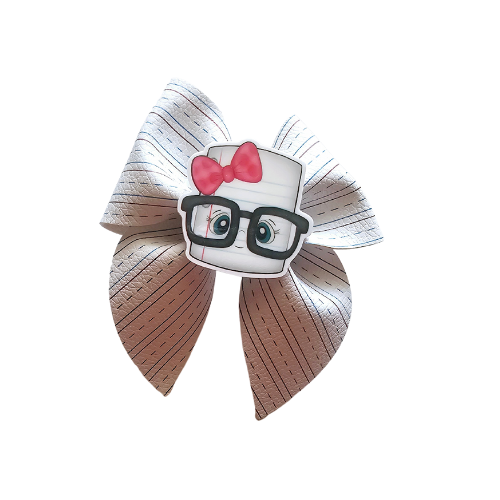 Handmade school notebook ponytail holders for girls featuring notebook-inspired designs, perfect for back-to-school outfits, picture day, and everyday school wear.