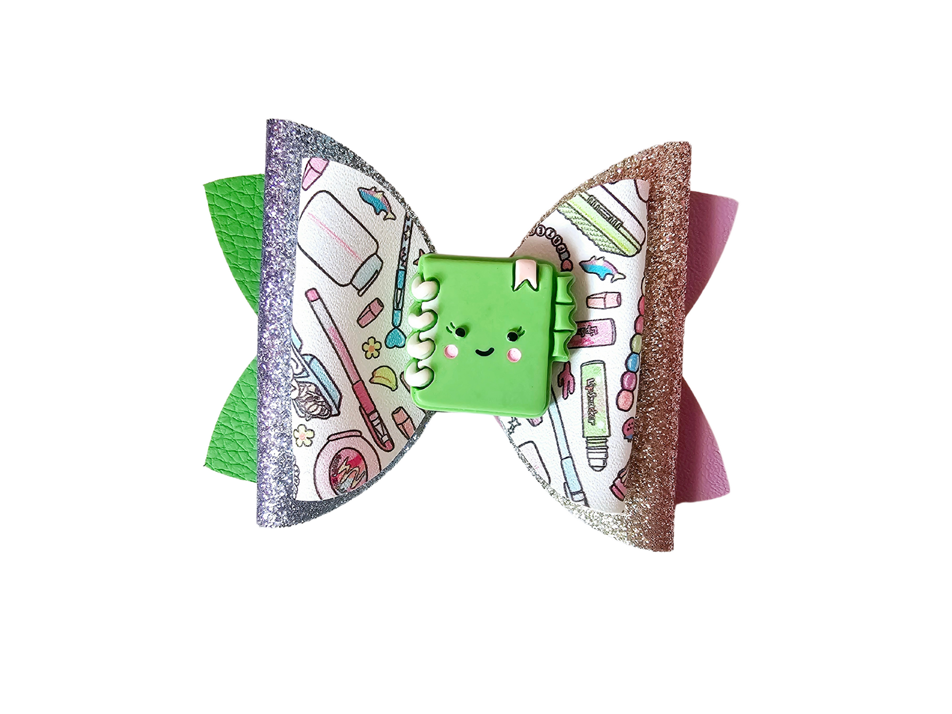 Handmade school supplies hair bows made from faux leather featuring colorful classroom designs, perfect for girls' back-to-school outfits.