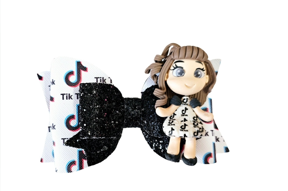 Handmade Halloween costume doll boutique hair bow featuring a spooky character-inspired design for girls.