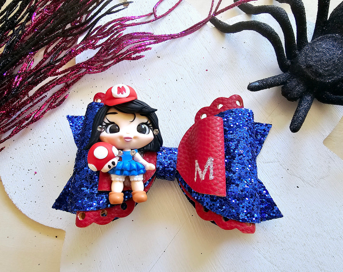 Handmade Halloween costume doll boutique hair bow featuring a spooky character-inspired design for girls.