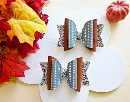 Handmade This Way or That Way faux leather boutique hair bow with neutral fall arrow-inspired design.