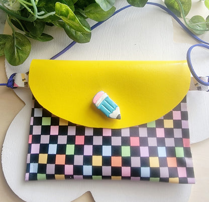 Handmade back-to-school gift set featuring a crayon hair bow, matching purse, and wristlet for girls.