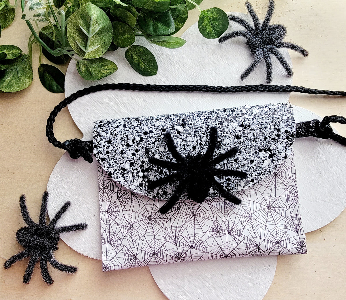 Handmade Spider Web Halloween accessory bundle with matching purse, hair bow, headband, and wristlet.