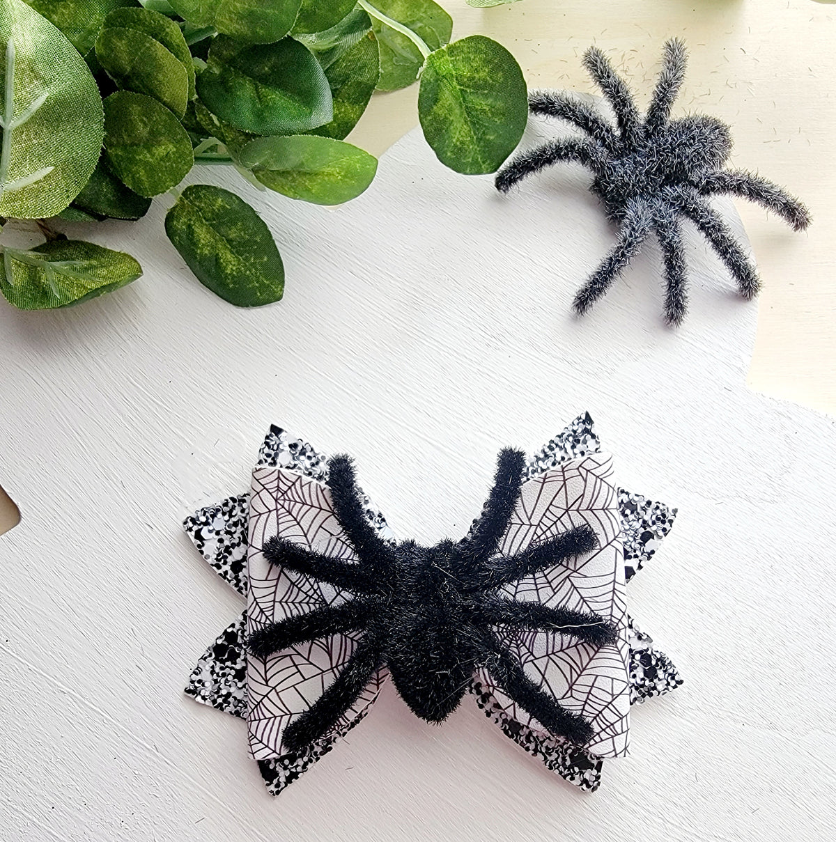 Matching Spider Web Halloween accessory set including a purse, bow, headband, and wristlet.